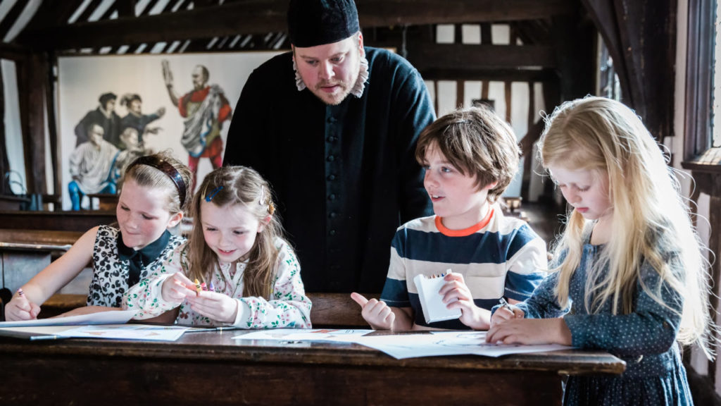Children at Shakespeare's schoolroom in Warwickshire